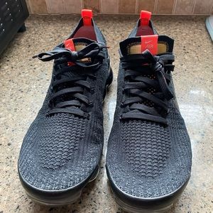 Nike VaporMax 11.5, fits a half size big. Worn maybe a dozen times.
